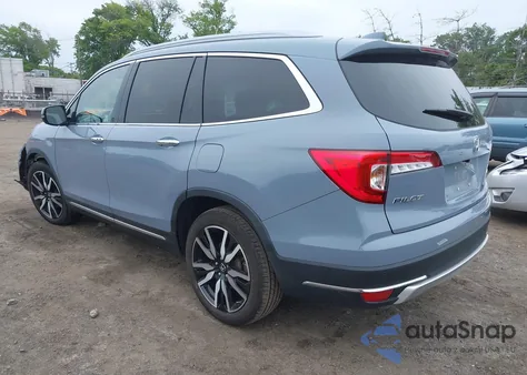2022 Honda Pilot Touring z USA, uszkodzony, nr VIN 5FNYF6H68NB056077